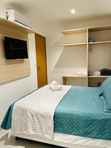 Apto 1 Quarto + Sala para 4 Pessoas – Piscina, Jacuzzi, e Acesso à Praia