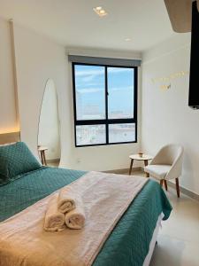 Apto 1 Quarto + Sala para 4 Pessoas – Piscina, Jacuzzi, e Acesso à Praia