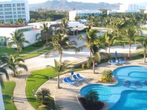 Depa en Acapulco Diamante - Albercas, Canchas y Jardines Apartment in Acapulco Diamante - Pools, Sports Courts and Garden Views