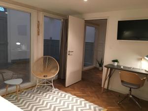 Appartements Gite Le Temple - Appart Hotel : photos des chambres