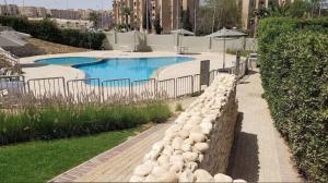 Luxerious apartment with a private garden and pool access