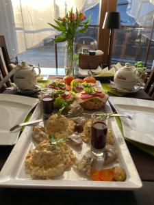 Pokoje i apartamenty nad Letniskową