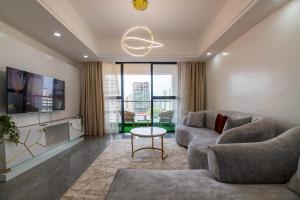 Executive comfort apartments with ample parking space, swimming pool, modern equipped gym, and amazing city views