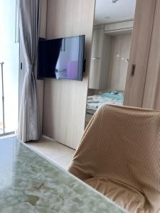 City Garden Olympus condo with balcony washing machine