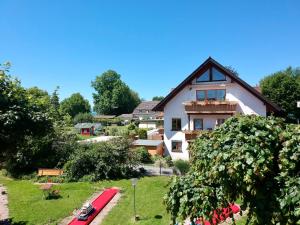 Ferienwohnung Kuprella 1 - mit Garten und privatem Seezugang in Nonnenhorn