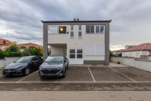 Apartments with parking space Vir - 25015