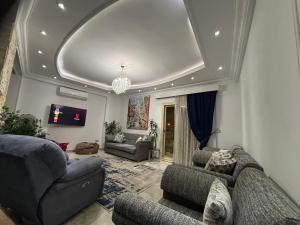 New Cairo Shared Apartment with the landlord close to airport garden view for males only or married couple because of the Egyptian Culture