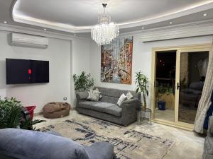 New Cairo Shared Apartment with the landlord close to airport garden view for males only or married couple because of the Egyptian Culture