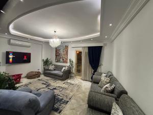 New Cairo Shared Apartment with the landlord close to airport garden view for males only or married couple because of the Egyptian Culture