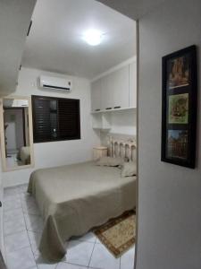 Lindo apartamento em frente à praia com piscina