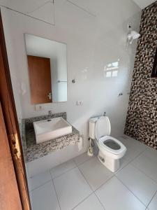 Casa agradável com churrasqueira e área externa