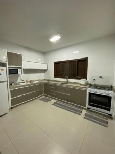 Casa agradável com churrasqueira e área externa