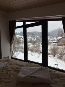 Domivka котедж із чаном-джакузі, каміном і кіно-зоною у Cлавську