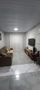 Casa com piscina na praia