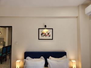 Central Candolim 1BHK Apartment Bright Living, TV & Kitchenette