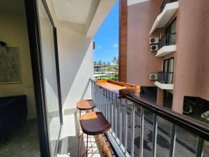 Central Candolim 1BHK Apartment Bright Living, TV & Kitchenette