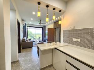 Luxury 2BHK Nature Retreat in Candolim with Pool Access, Nature Views & Fully Equipped Kitchen