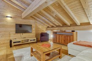 Appartement LE BUET skis aux pieds, piscine & Spa