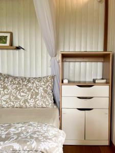 A Handcrafted Hilltop Retreat Beneath MT Batukaru