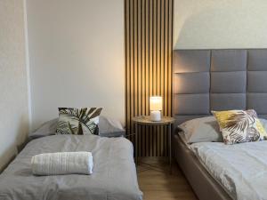 Simcity Bratislava I FREE PARKING,24 7 self check-in, balcony, quiet location with easy transportation to city square