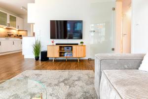 BeltBlick 14- Küstenleuchten - Moderne Ferienwohnung direkt am Strand mit Sauna und Garten!