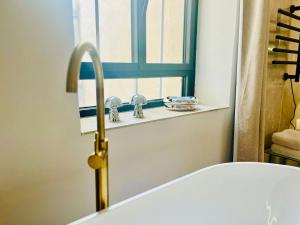 "Pandora" Studio Romantique, Baignoire,Clim, Wifi