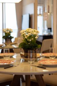 Book Santos Unlimited 2103 - Elegância e Vista Mar