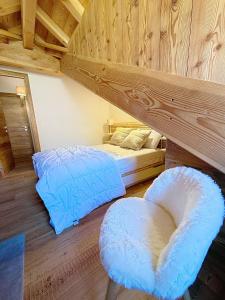 Le Sommet du Loup Duplex 82m2 3 chambres Vue montagne Garage et skiroom