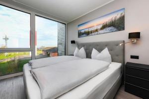 BeltBlick 3 - Moderne Ferienwohnung direkt an der Ostsee mit Meerblick und Sauna!