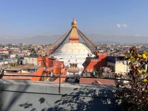 Bedroom with Balcony and Boudha Stupa View