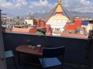 Bedroom with Balcony and Boudha Stupa View