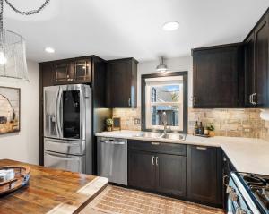 Luxurious 1875 centrally located Canton Akron home, expansive primary & sunset view