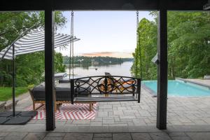 Secluded 3 Acre 5 BR Resort with Heated Private Lakeview Saltwater Infinity Pool, Hot Tub, Boat House, Sauna, and Game Room