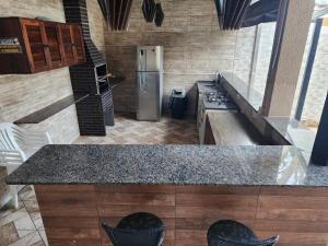 CASA COM PISCINA AQUECIDA - Perequê-Açu