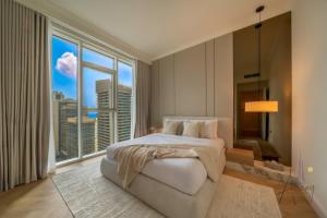 Elite Beachfront Living Stylish High-Floor 1BR