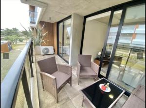 Modern beachfront apartment with pool