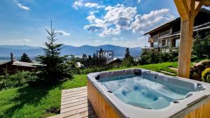 1ère Étoile vue lac jacuzzi prestation premium