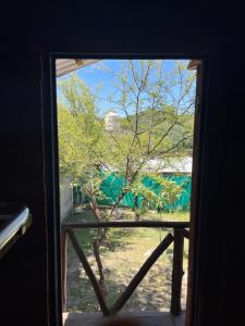 Cabaña serrana con pileta privada y vistas a las sierras, Unquillo