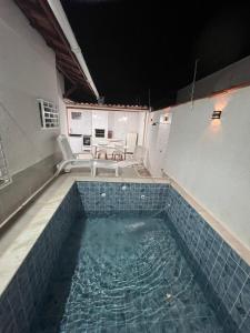 Casa Aconchegante em Itanhaem- Piscina e Churrasqueira 10 pessoas