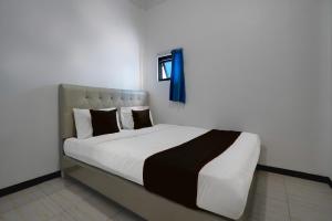 Hotel O 94843 Syariah Hj. Lilis Sukabumi