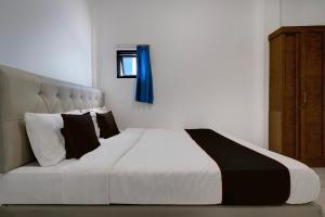 Hotel O 94843 Syariah Hj. Lilis Sukabumi