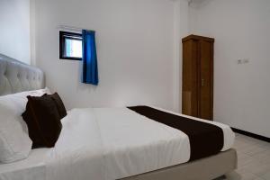 Hotel O 94843 Syariah Hj. Lilis Sukabumi