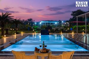 StayVista at The Red Creek with BBQ and Bonfire