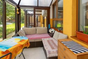 Cozy Nest with Glass Veranda