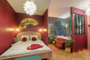 Suite jacuzzi chic et romantique climatisé