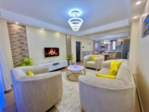 spacious living apartment with fully equipped gym heated swimming pool private parking space, children play area and amazing scenic views