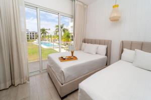 Vista Pearl @Cana Pearl Deluxe Pool View 2B Condo