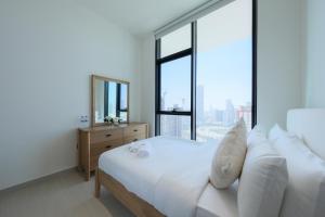 High-End 2BR JVC Retreat with Private Balcony Pool