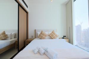 High-End 2BR JVC Retreat with Private Balcony Pool