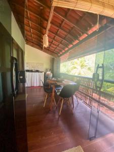 Flat Iansã Condomínio beira-mar Varanda Piscina.